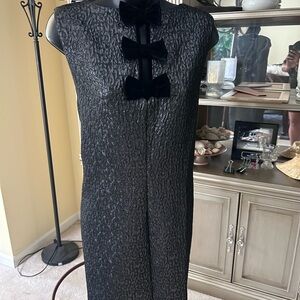 Elegant Black Textured Dress with Bow Accents